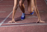 close-up of the hands of the runner at the start