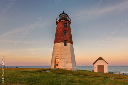 The Point Judith lighthouse at sunset near Narragansett  Rhode Island  USA.
