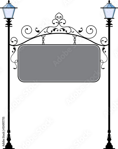 Wrought Iron Signage With Lamp