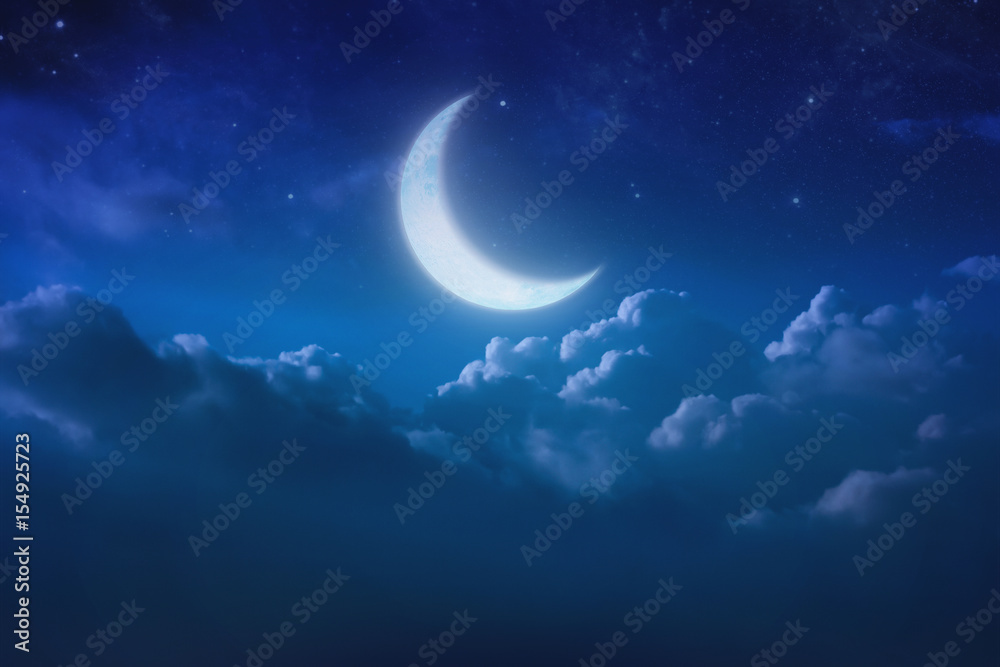 Fototapeta premium half blue moon behind cloudy on sky and star at night. Outdoors at night. lunar shine moonlight over cloud at nighttime with copy space background for headline text and graphic design.