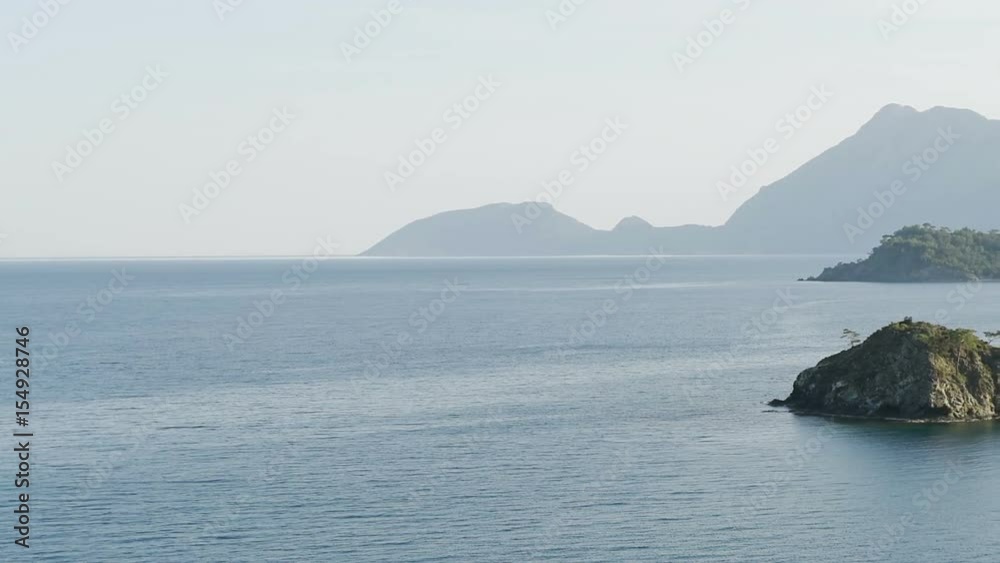 Picturesque Mediterranean seascape in Turkey. View of a small bay near the Tekirova village, District of Kemer, Antalya Province. Picturesque Mediterranean seascape in Turkey. View of a small bay near the Tekirova village, District of Kemer, Antalya Province.