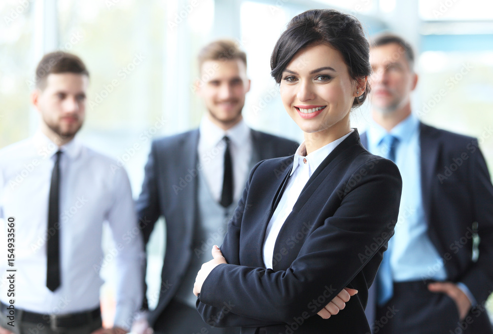 beautiful woman on the background of business people beautiful woman on the background of business people