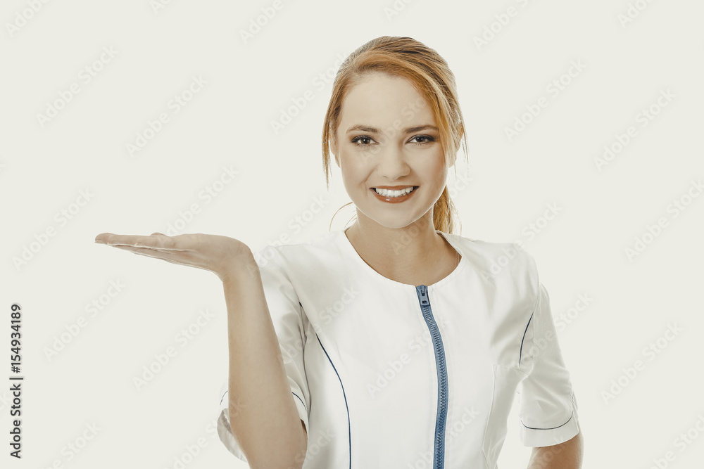 Young female doctor holding an abstract space. Young female doctor holding an abstract space.