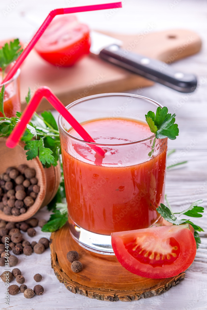 Tomato juice on white background Tomato juice on white background
