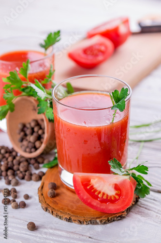 Tomato juice on white background