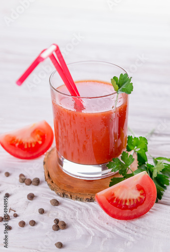 Tomato juice on white background