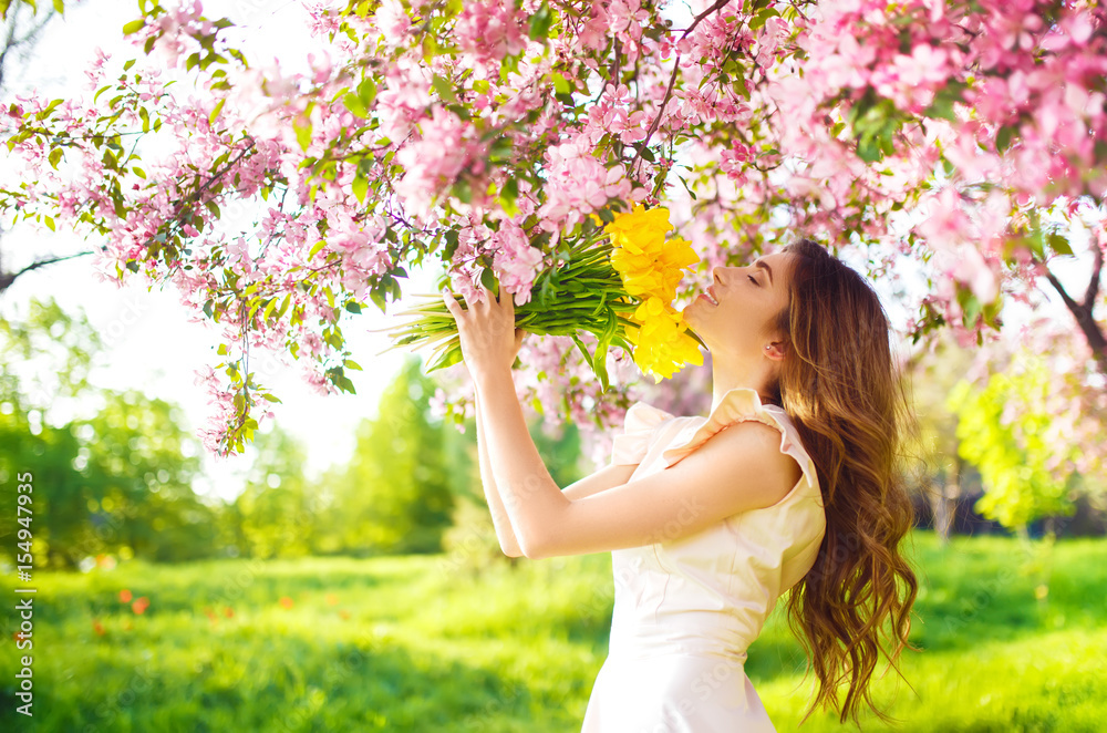 beautiful young girl with a bouquet of yellow tulips. Good spring mood.
beautiful young girl with a bouquet of yellow tulips. Good spring mood.
