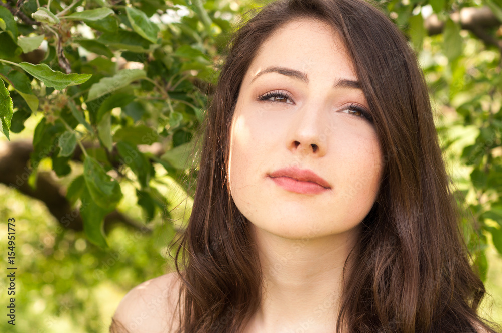 Outdoors portrait of beautiful young brunette girl Outdoors portrait of beautiful young brunette girl