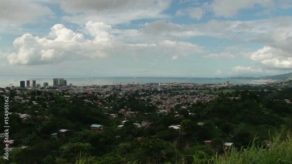Slow elevated pan across Port of Spain, Trinidad. Taken from Lady Young Road overlook point