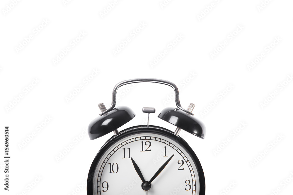 black alarm clock isolated on white table background. black alarm clock isolated on white table background.