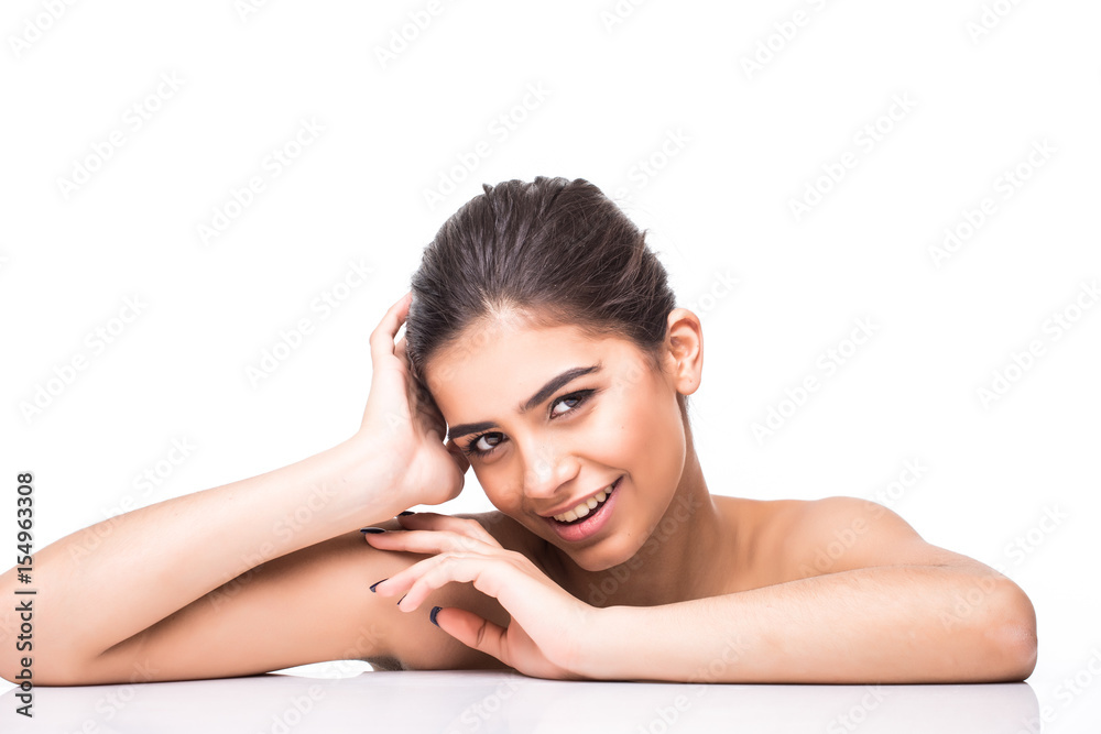 Fototapeta premium Beautiful beauty young female model girl touching her face skin cheeks hands fingers.