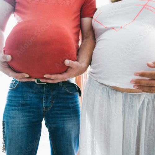 Belly of a pregnant woman photo