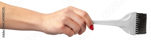 woman hand holding face brush