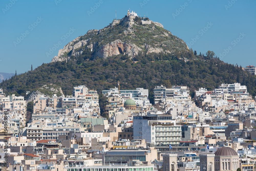 Cityscape of Athens and Lycabettus Hill , Athens, Greece.
