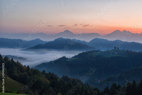 Slovenia, Morning landscape with fog in mountains