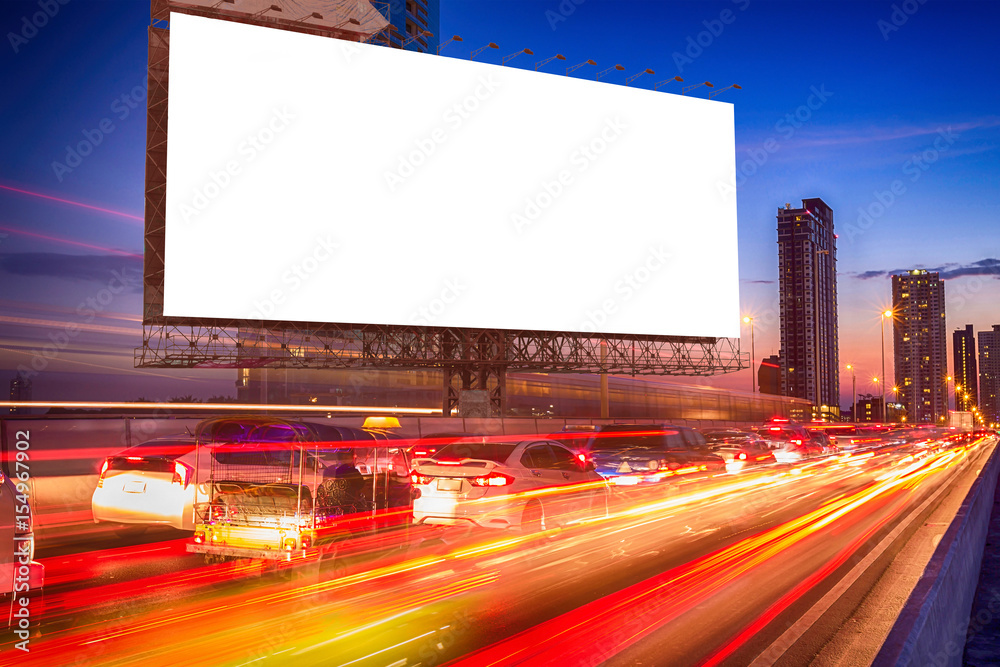 large billboard in the night traffic jam large billboard in the night traffic jam