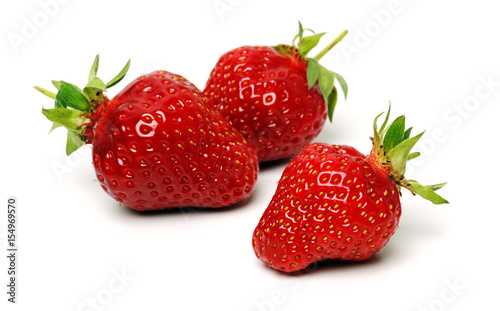 three ripe strawberries