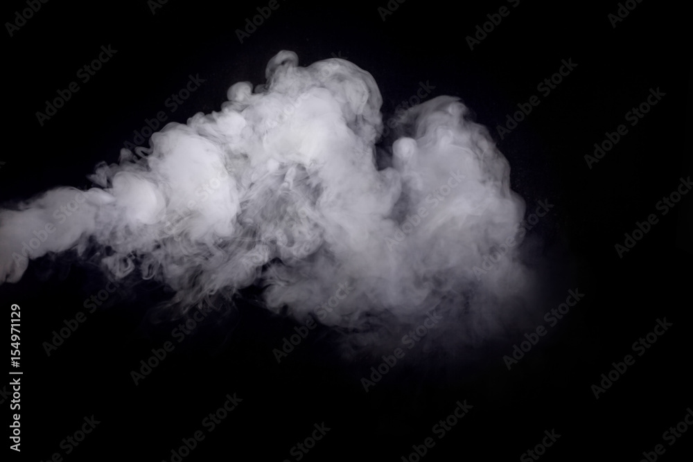 Abstract white smoke against dark background Abstract white smoke against dark background