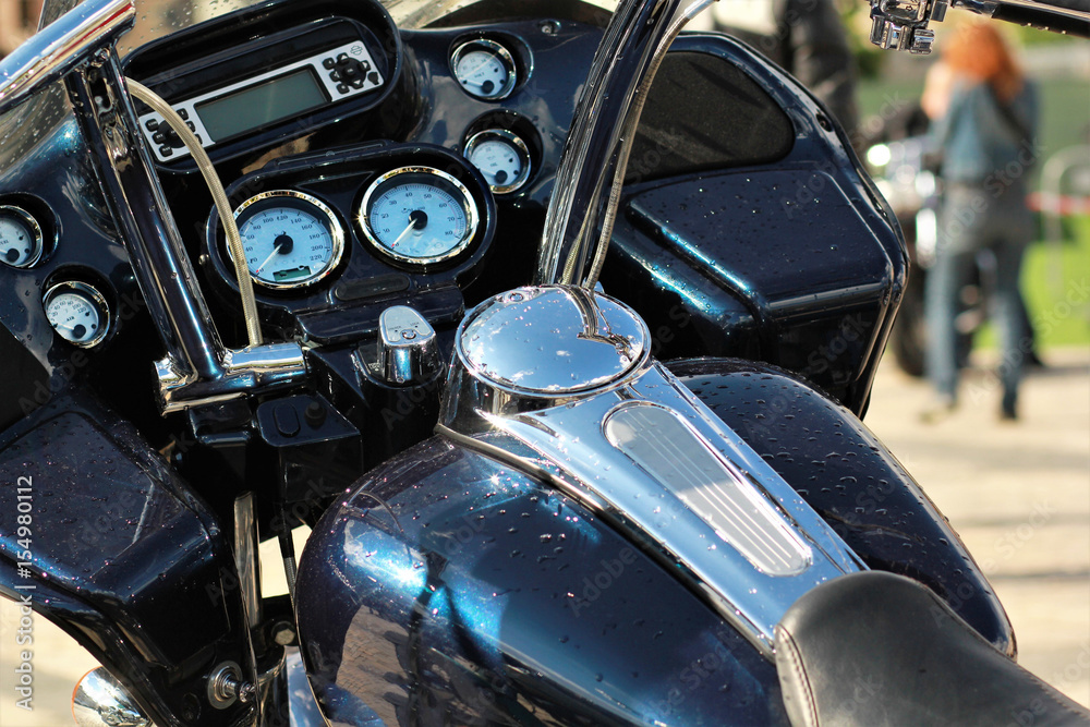 Close up of a dashboard of dark blue motorbike