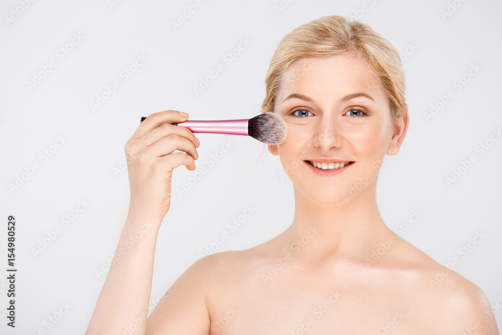 Portrait of young pretty girl over white background. Portrait of young pretty girl over white background.