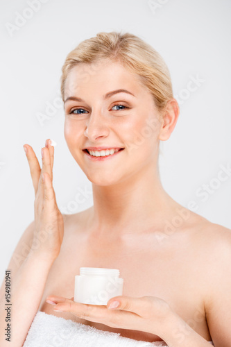 Portrait of young pretty girl over white background.