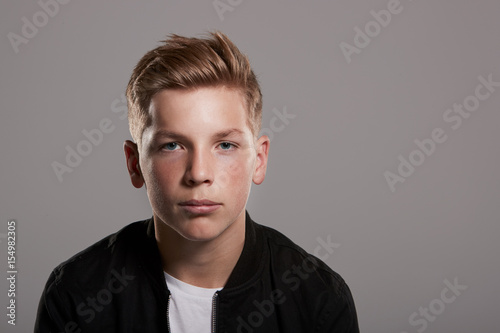 White teenage boy looking to camera, portrait,front view, horizontal