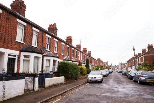 OXFORD  UK- OCTOBER 26 2016  Exterior Of Victorian Terraced Houses In Oxford With Parked Cars