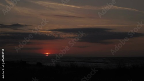 Windy sunset on the swirl sea