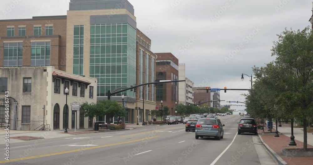 WILMINGTON, NC - Circa May, 2017 - An overcast establishing shot of downtown Wilmington, North Carolina. WILMINGTON, NC - Circa May, 2017 - An overcast establishing shot of downtown Wilmington, North Carolina.
