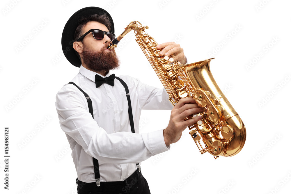 Naklejka premium Bearded man playing a saxophone