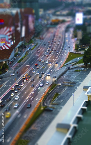 Photography Cityscape of cars travelling on massive highway with miniature effect