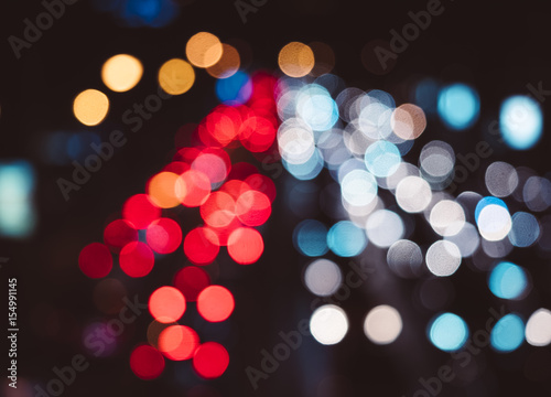 Bokeh lights colourful Lighting on Black background Night scene © VTT Studio