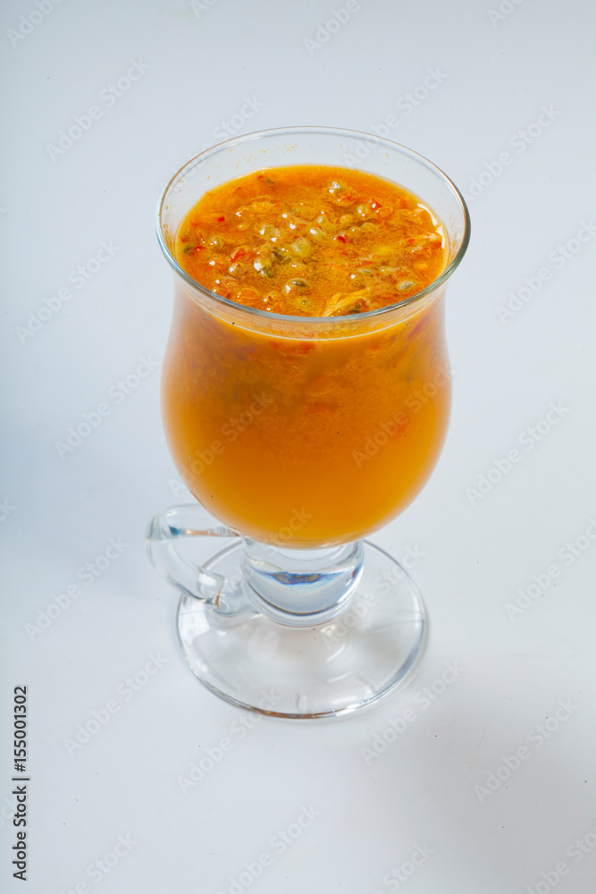 Tea with sea buckthorn on white background Tea with sea buckthorn on white background