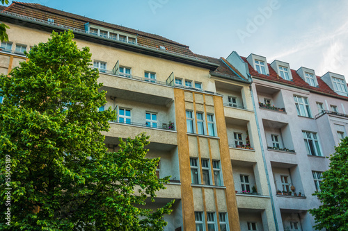 yellow and pink apartment building at prenzlauer berg