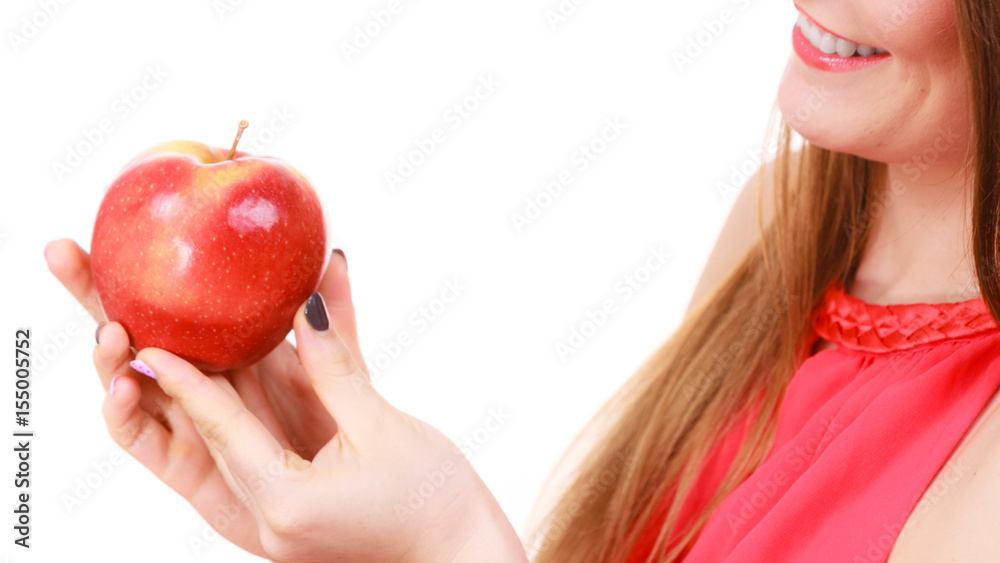 Woman charming girl holds apple fruit Woman charming girl holds apple fruit