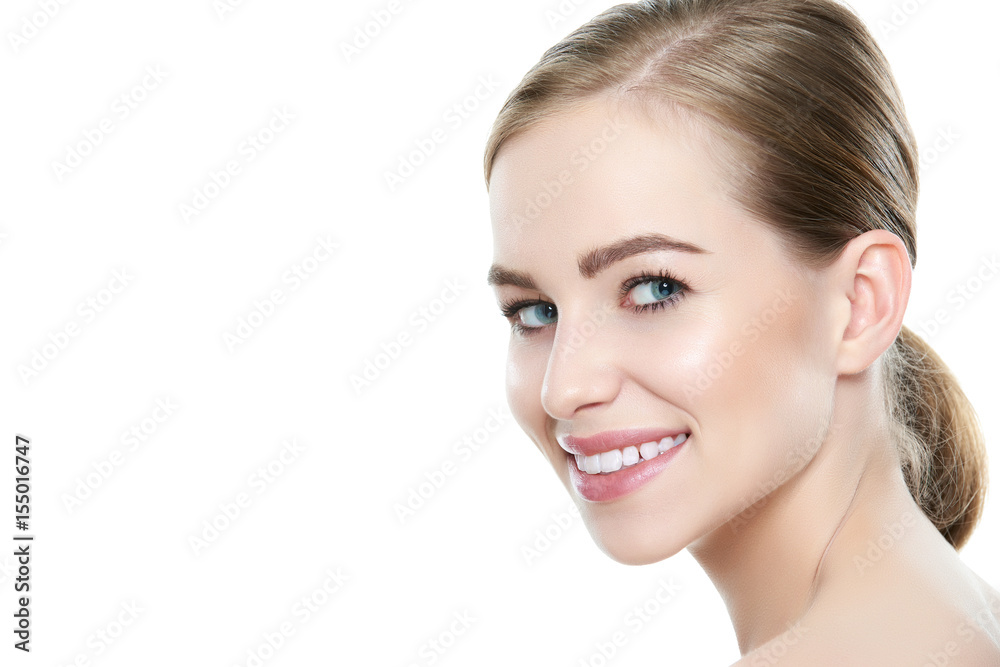 Beautiful young blond smiling woman with clean skin, natural make-up and perfect white teeth white background Beautiful young blond smiling woman with clean skin, natural make-up and perfect white teeth white background