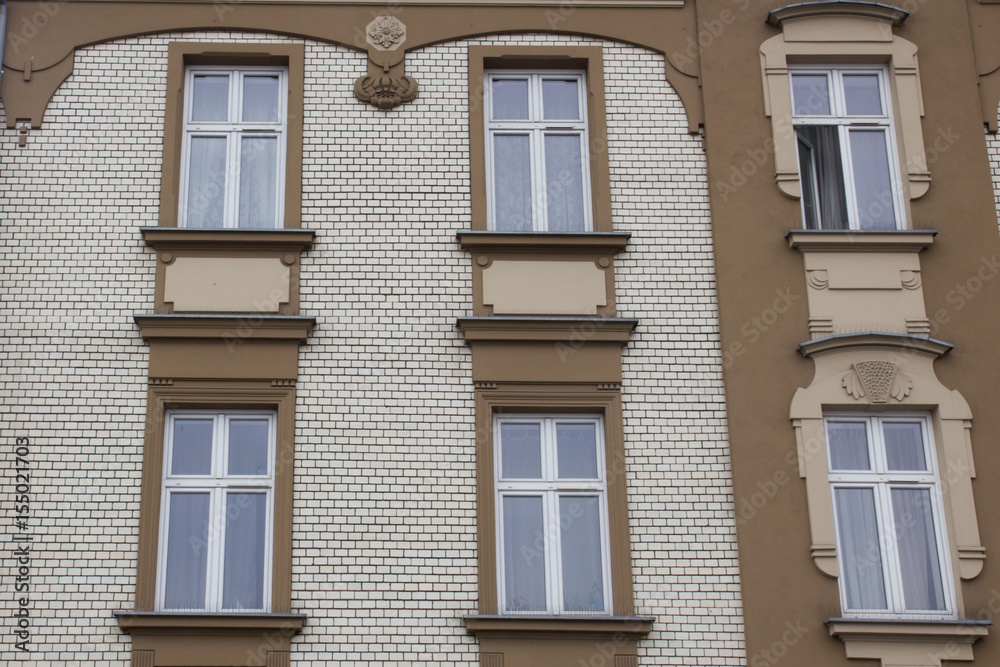 Six Windows on the facade of a brick house