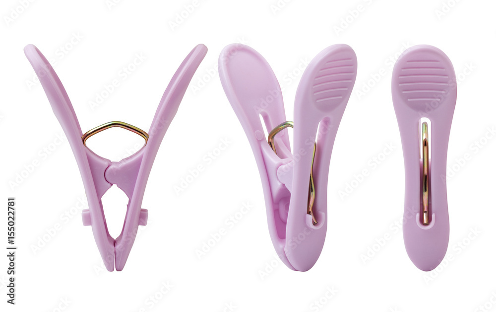 Purple plastic clothes pin isolated on white background Purple plastic clothes pin isolated on white background
