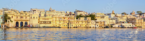 Panoramic view of historical buildings on water in Udaipur , Rajastan, India. View from Pichola Lake