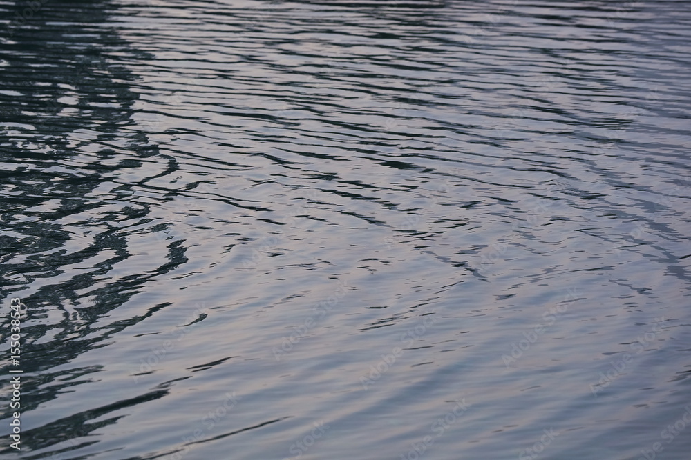 Ring wave on water texture for background or texture. Soft focus. Ring wave on water texture for background or texture. Soft focus.