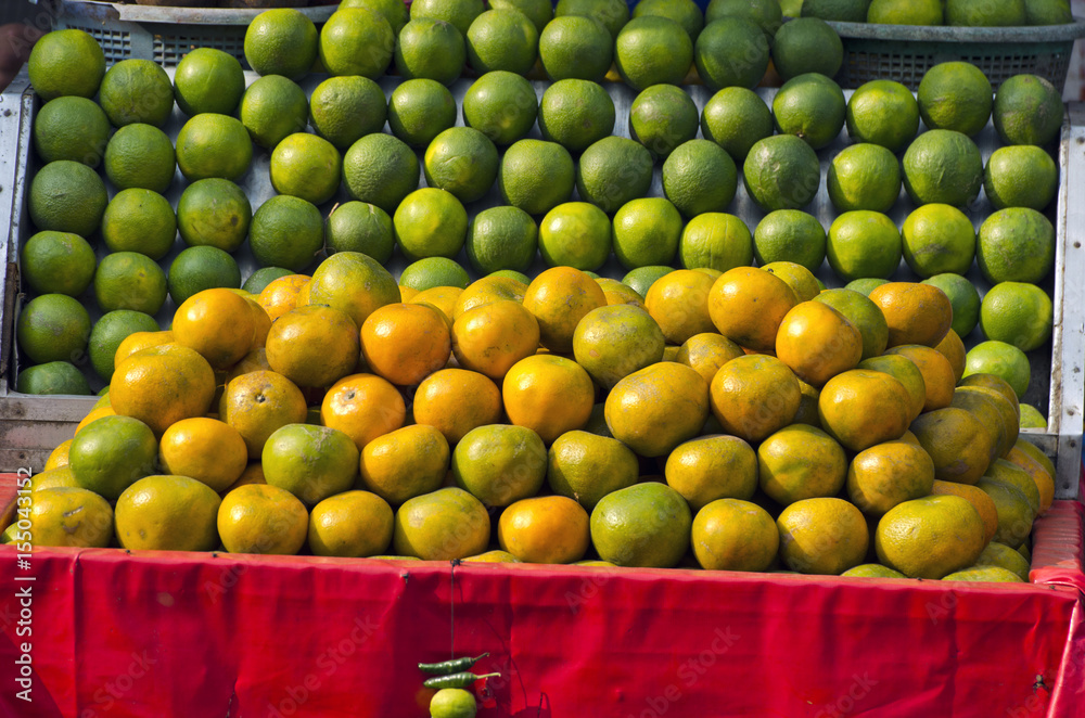 citrus  fruits on stall in stret market, India