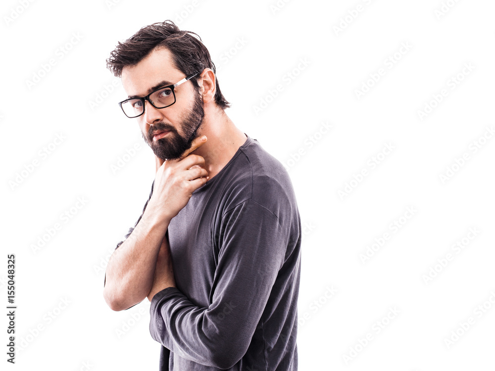 Portrait of a young bearded man with glasses Portrait of a young bearded man with glasses