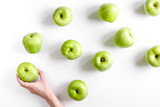summer food with green apples on white background top view