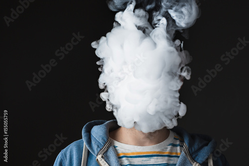 The face of vaping young man photo