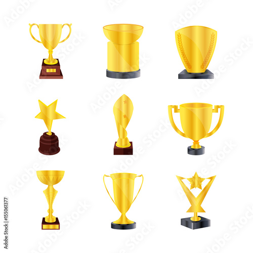 Set of different kind golden trophies, golden bowls. Winners cup.