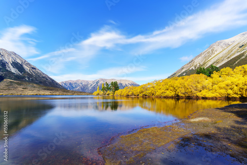 Beautiful scenery of Lake Pearson (Moana Rua) in Autumn with reflection , Arthur's pass National Park , South Island of New Zealand