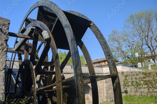 Groppello (Italy): big wooden wheel on Martesana photo