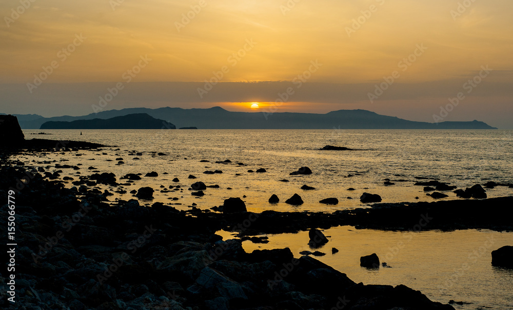Greece, Crete, sunset in Chania (Xania) evening light to city harbour