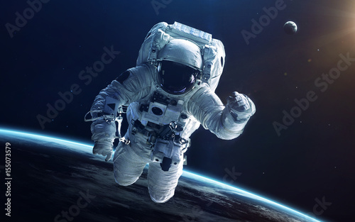 Astronaut in deep space. Elements of this image furnished by NASA photo