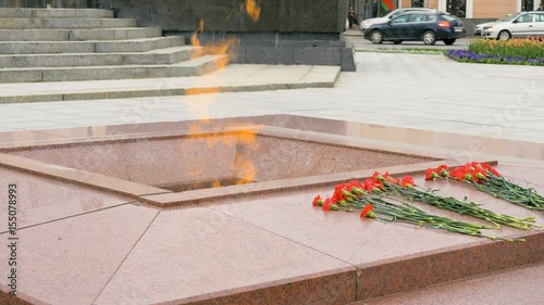 Eternal flame on the Victory Square in Minsk, Belarus - slowmotion 60 fps photo